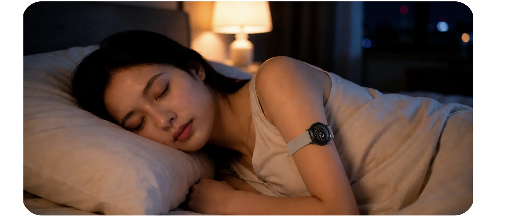 Woman sleeping comfortably while wearing the Fayn CGM Shield
